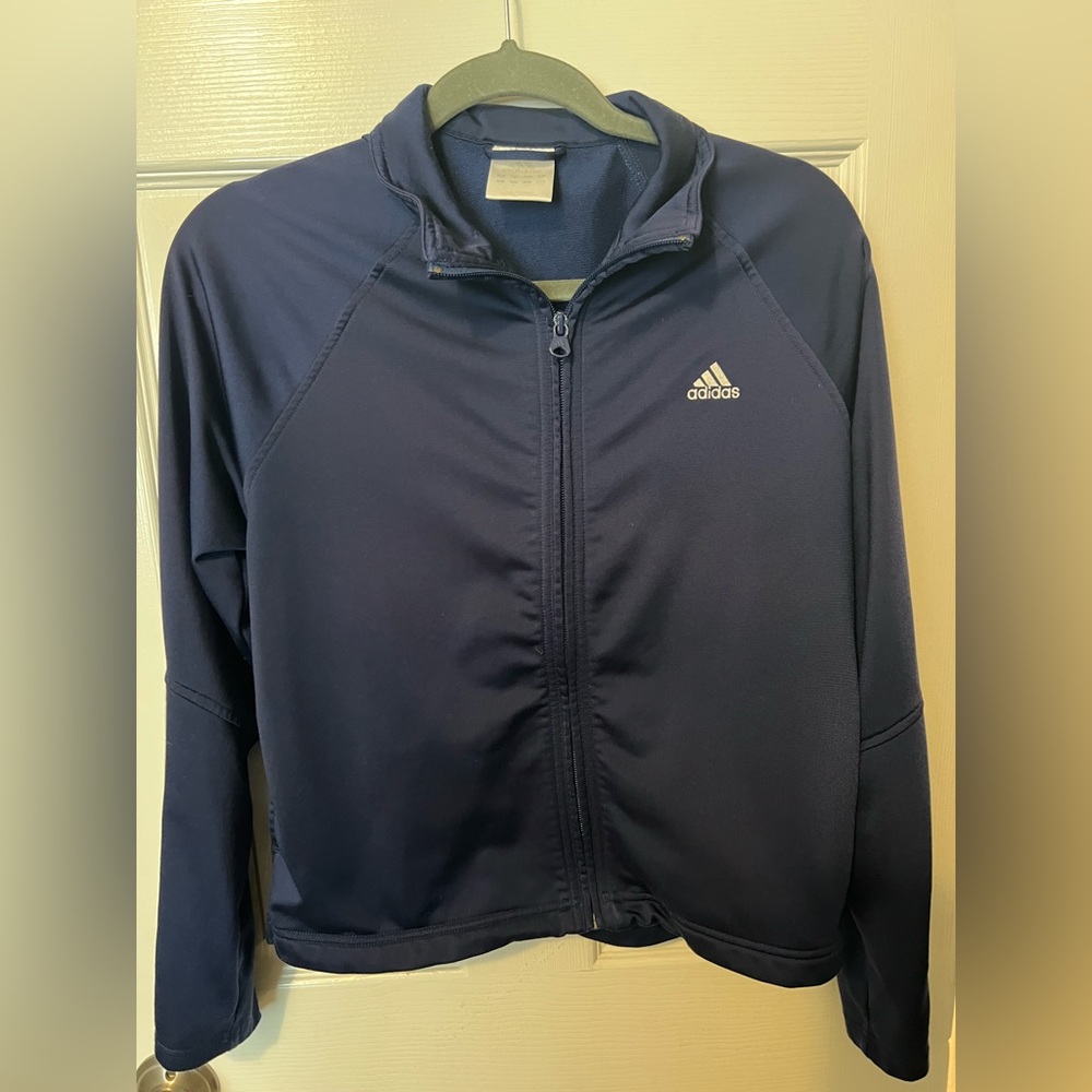 Woman’s vintage 90s blue tracksuit zipper top